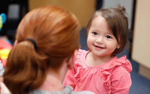 a little girl smiling