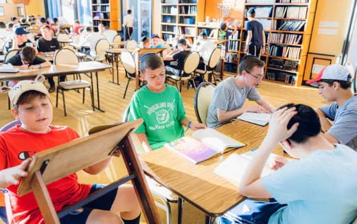 a group of people sitting at tables