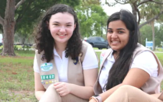 a couple of women smiling