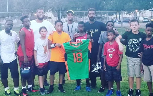 a group of people posing for a photo