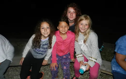 a group of people posing for the camera