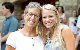 a man and woman smiling