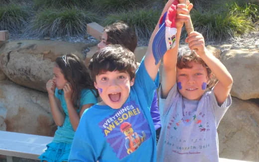 a group of children posing for a photo