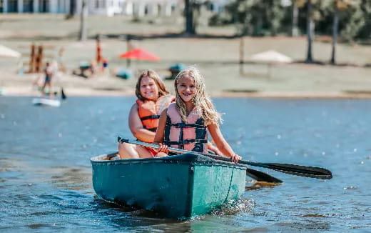 two girls in a canoe