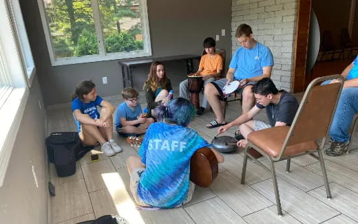 a group of people sitting in chairs
