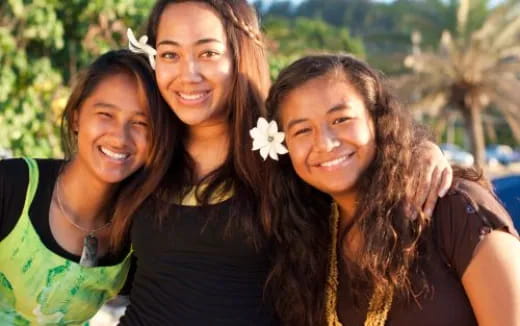 a group of women smiling