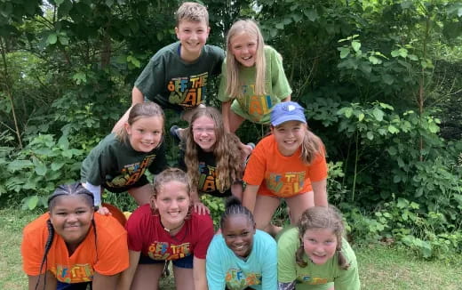 a group of people posing for a photo