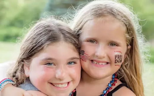 a couple girls smiling