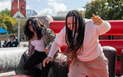 a woman holding a man