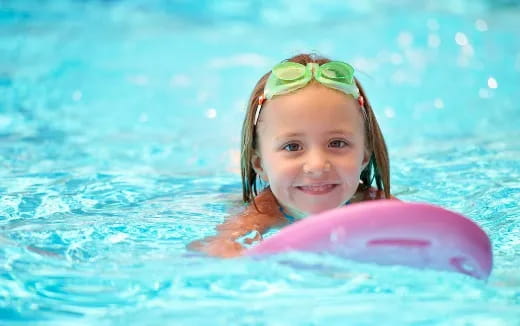 a girl in a pool