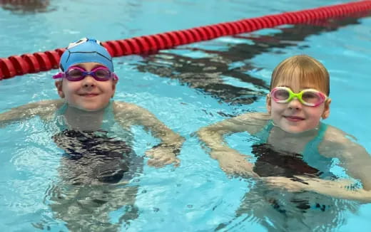 two children in a pool