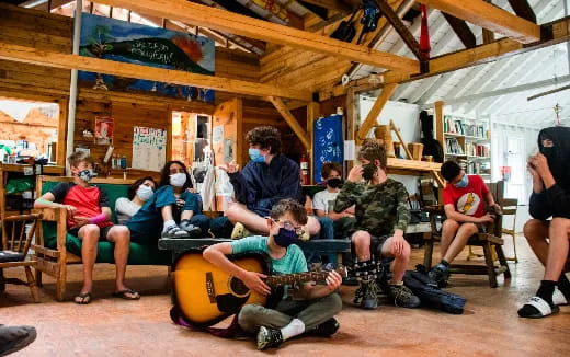 a group of people sitting in chairs