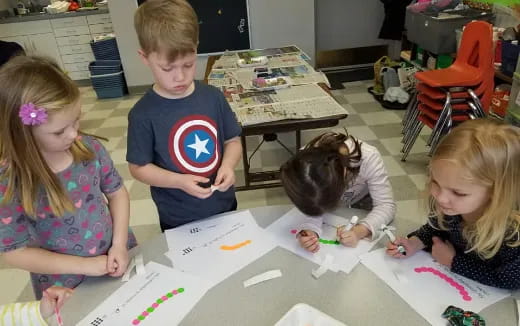 children sitting at a table