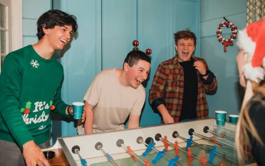 a group of men smiling