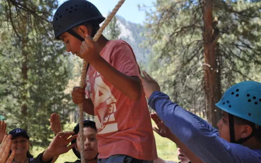 a person swinging a baseball bat