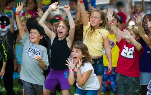 a group of people cheering