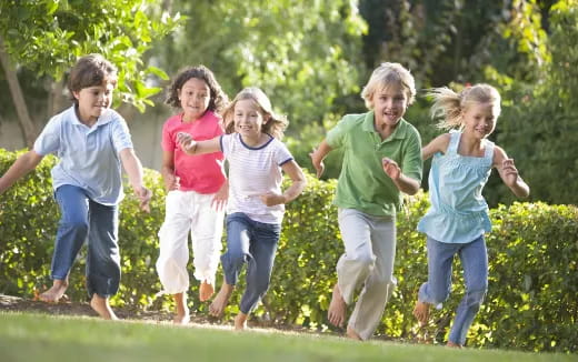 a group of children running