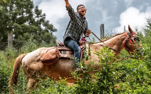 a man riding a horse