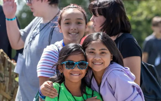 a group of people posing for a photo
