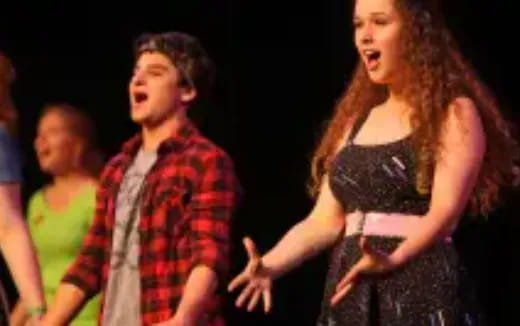 a man and woman dancing