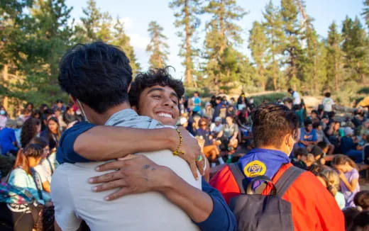 a group of people hugging