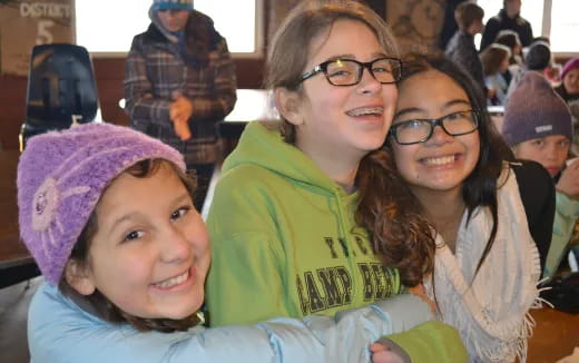 a group of people posing for the camera