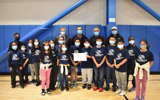 a group of people posing for a photo