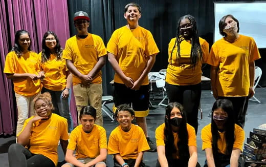 a group of people wearing masks