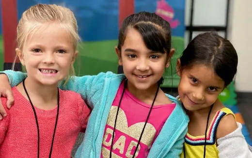 a group of children smiling