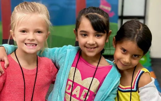 a group of children smiling