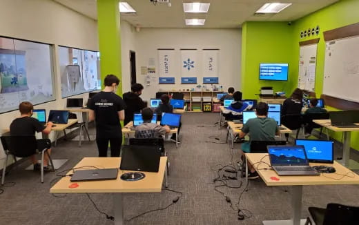 a group of people in a classroom