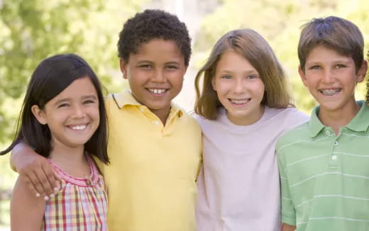 a group of children smiling