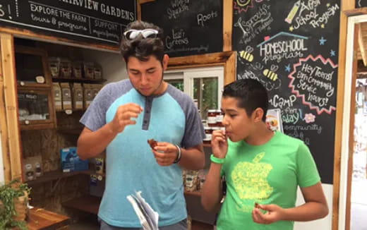 a person and a boy eating ice cream