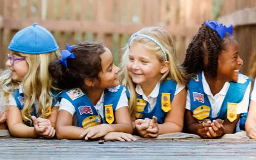 a group of girls in blue uniforms