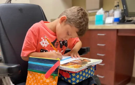 a child opening a box
