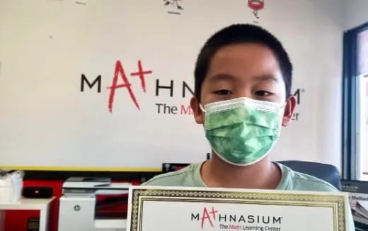 a boy wearing a mask