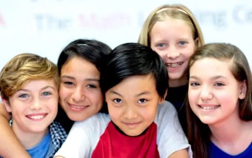 a group of children smiling