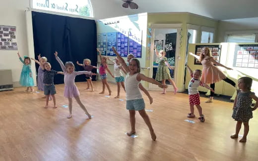 a group of children dancing