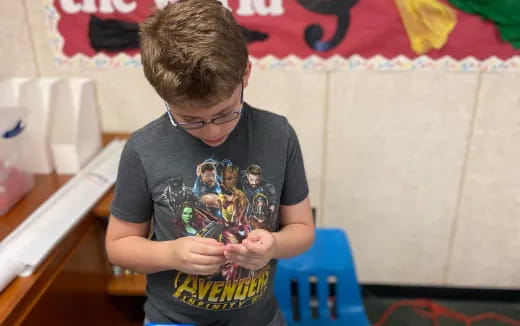 a boy wearing glasses