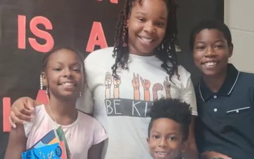 a group of people posing for the camera