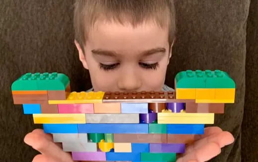 a boy playing with toys