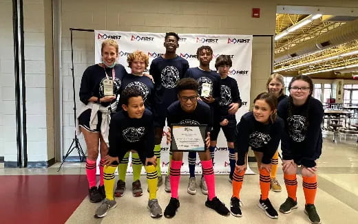 a group of people posing for a photo