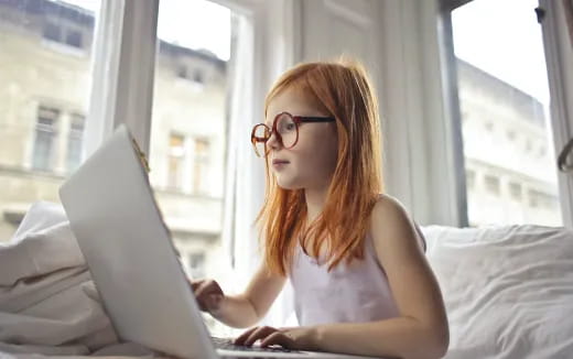 a woman using a laptop