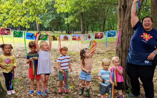 a group of children standing outside