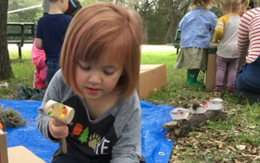 a child eating a cupcake