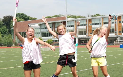 a group of girls playing a sport