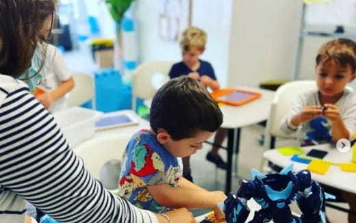a group of children in a classroom