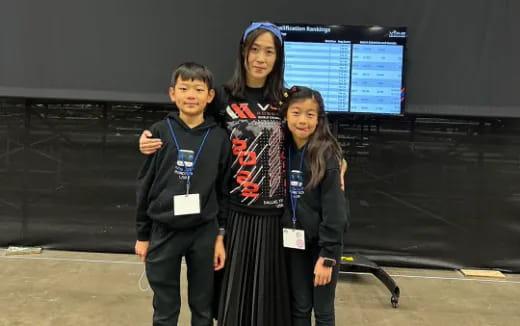 a group of people posing for the camera