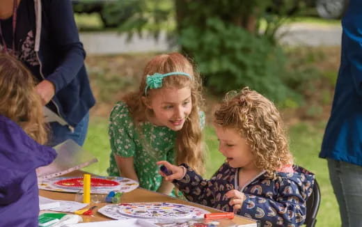 a group of children painting