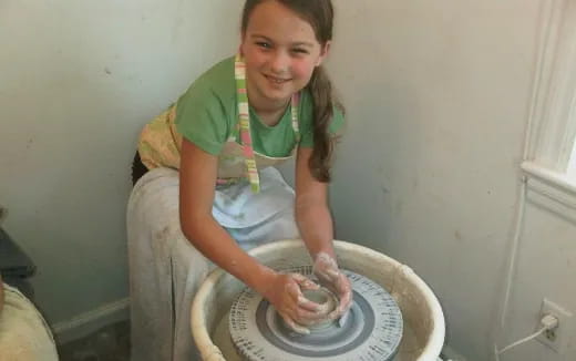 a person holding a snake